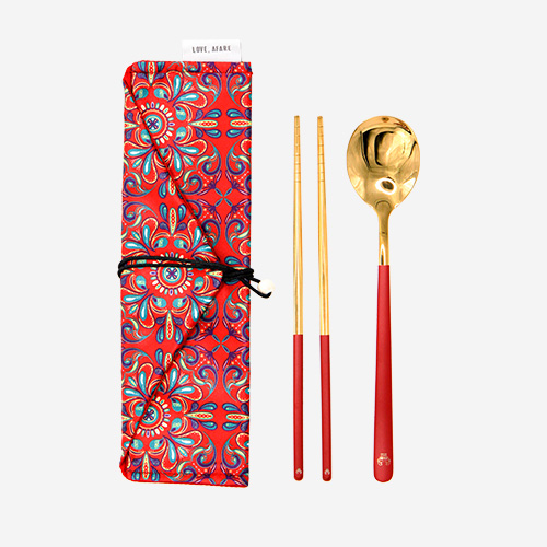 Love, Afare Cutlery Set Red – Stylish and reusable cutlery that comes with a spoon and a pair of chopsticks wrapped in a compact and vibrant Peranakan-inspired cloth pouch for eco-friendly dining.