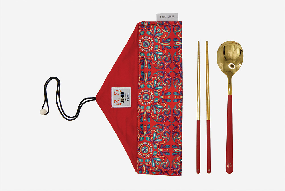 Love, Afare Cutlery Set Red – Stylish and reusable cutlery that comes with a spoon and a pair of chopsticks wrapped in a compact and vibrant Peranakan-inspired cloth pouch for eco-friendly dining.