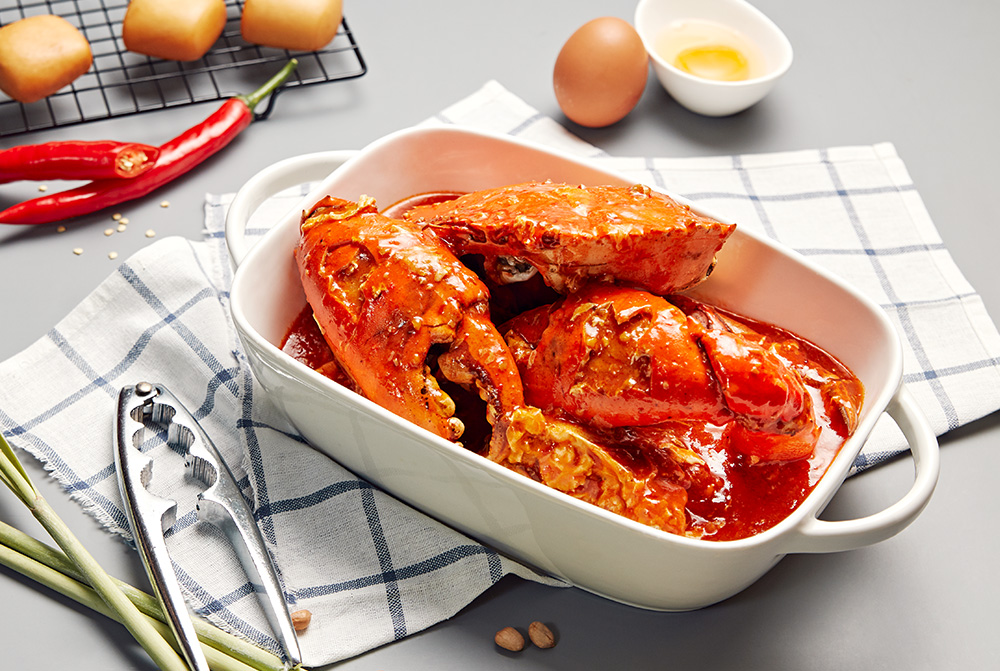 Singapore Chilli Crab Paste – Rich, sweet, and spicy paste by JUMBO Seafood, bringing the award-winning Chilli Crab flavour to your kitchen. Click in to recreate this iconic dish!